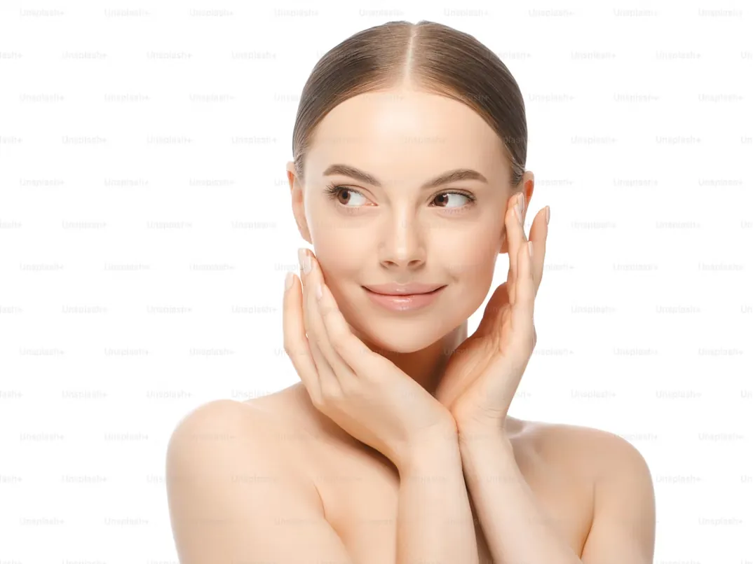 Smiling skin care portrait in bright studio light